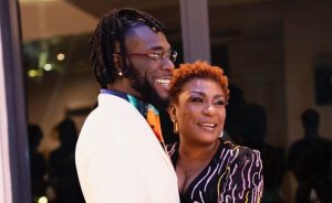 Burna Boys Mother Defends Son Amid Arrogance Backlash 300x184