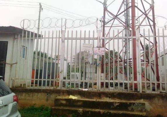 101925 oyo seals commercial banks telecom masts over non payment of tax photos