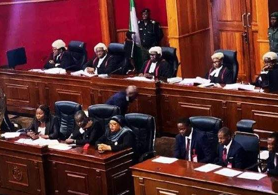 102432 tribunal affirms president tinubus election dismisses atiku obis petitions