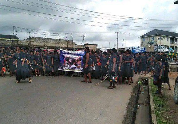105850 confusion as black clad widows stage street protest in umuahia