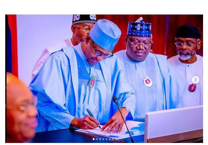 12237 Buhari signs 2023 budget
