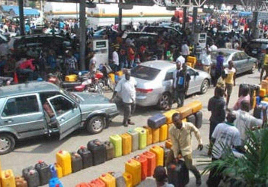 13296 fg blames fuel scarcity on cross border smugglers says over 1 6bn litres available