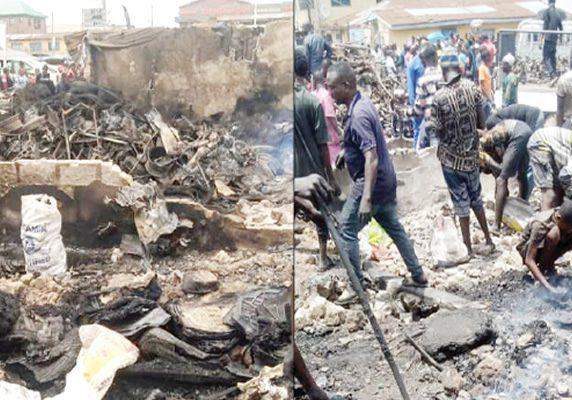26477 buhari sanwo olu others mourn as hoodlums kill guard burn shops 26477 buhari sanwo olu others mourn as hoodlums kill guard burn shops