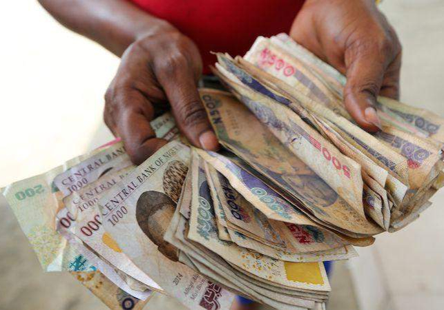 26704 enugu traders continue to reject old n500 n1000 notes 26704 enugu traders continue to reject old n500 n1000 notes