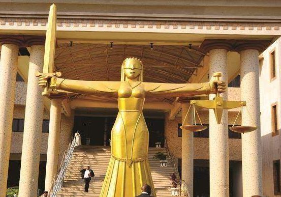 41014 court bars defence fct ministers from trespassing into abuja land 41014 court bars defence fct ministers from trespassing into abuja land