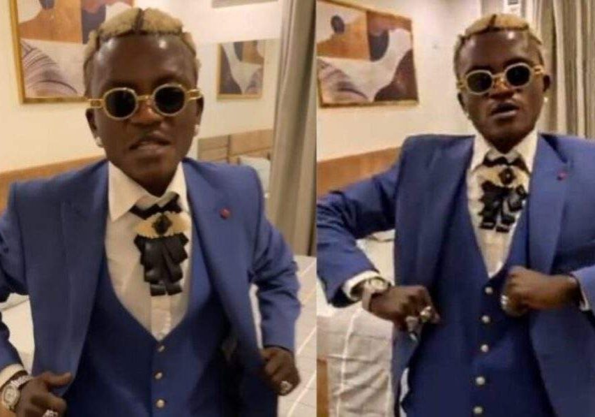 43553 im now a big man singer portable flaunts video of self donning suit for first time