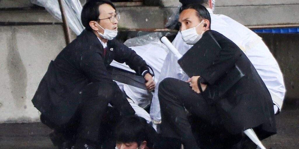 46250 japan pm safe after smoke bomb at speech report