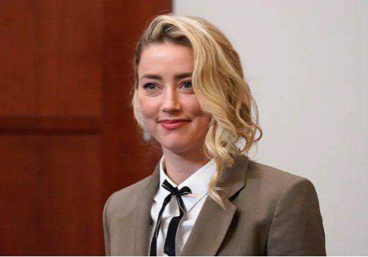 57461 jonny depps ex wife amber heard quits hollywood moves to spain report