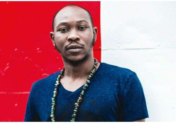 61566 seun kuti arrested for alleged assault manager claims police officer provoked him