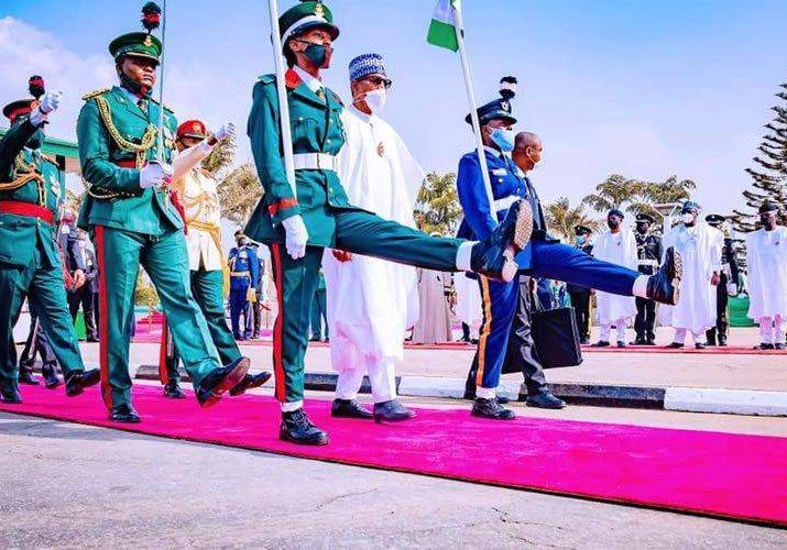 6821 buhari arrives national arcade for armed forces remembrance day