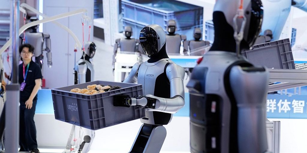 China Unveils Advanced Humanoid Robots at World Robot Conference Robots fight in boxing match at 2025 World Robot Conference