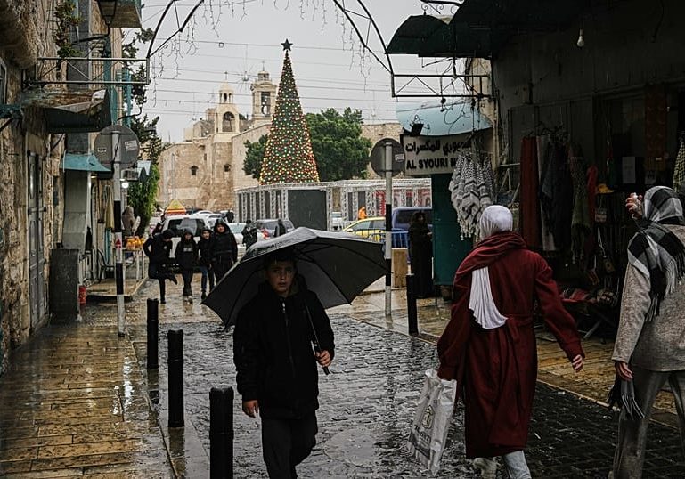 Christmas hymns return to Bethlehem after ceasefire brings brief respite