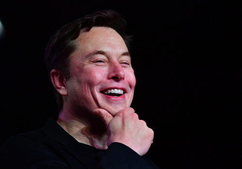 In this file photo taken on March 14, 2019 Tesla CEO Elon Musk reacts during the unveiling of the new Tesla Model Y in Hawthorne, California. Frederic J. BROWN / AFP