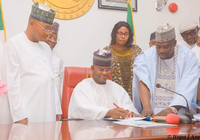 Governor Bello signs social investment bill 14 others into law Governor Bello signs social investment bill 14 others into law