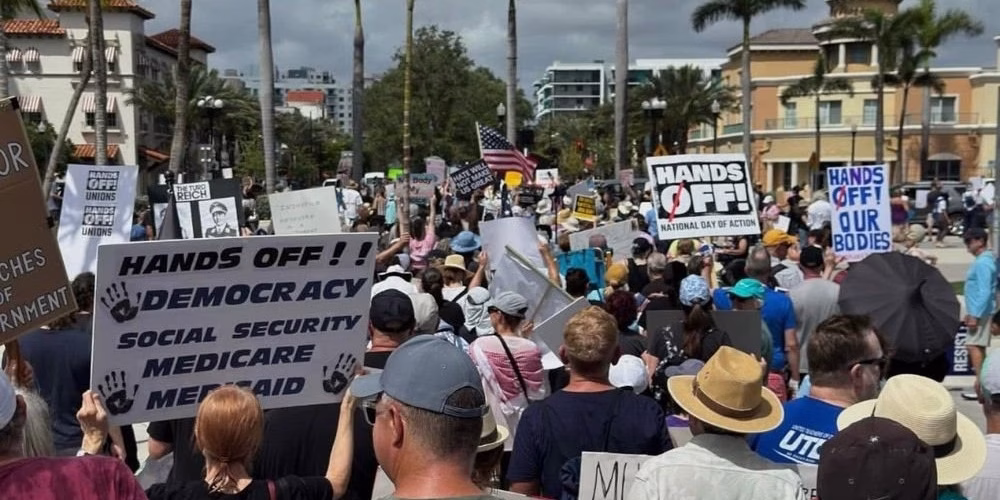 'Hands off' protests against Trump, Musk spread in US