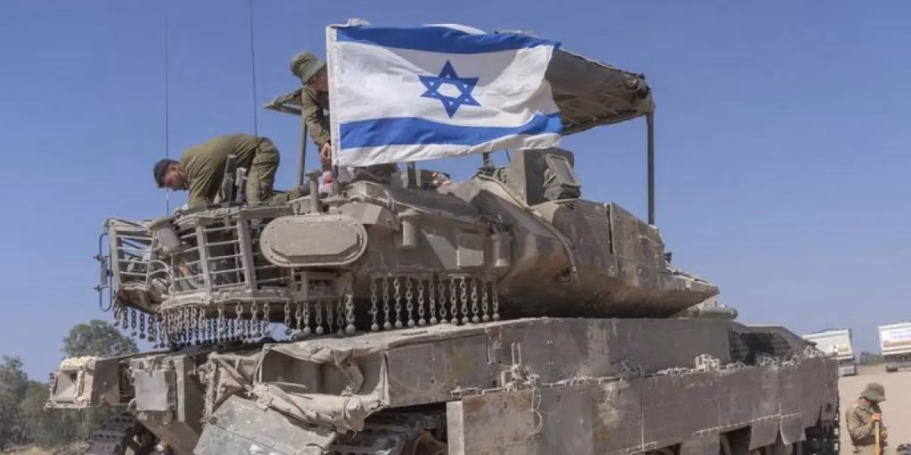 Israel kills senior Hezbollah militant, releases 4 prisoners