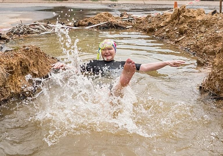 South African politician takes dip in pothole to show city management failures