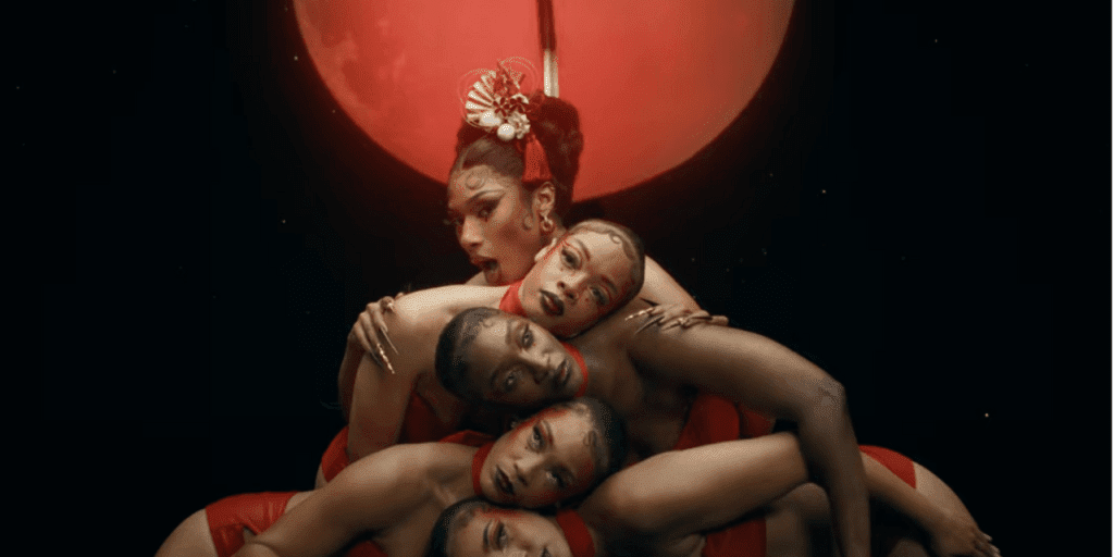 Megan Thee Stallion Unleashes Venomous Vixen in "Mamushi" Music Video Megan Thee Stallion Unleashes Venomous Vixen in "Mamushi" Music Video