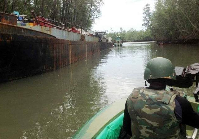 Navy hands over seized trawler 13 crew members to Bayelsa Navy hands over seized trawler 13 crew members to Bayelsa