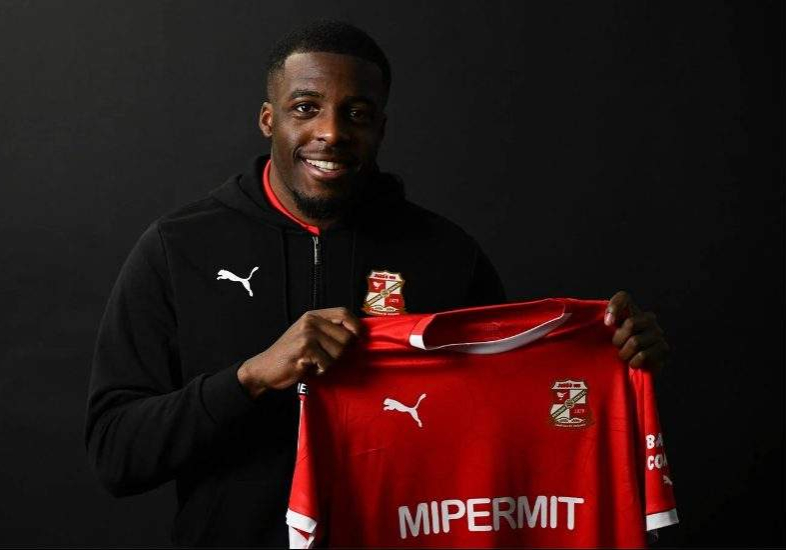 Nigerian Defender Nnamdi Ofoborh Signs with Swindon Town After Overcoming Nigerian Defender Nnamdi Ofoborh Signs with Swindon Town After Overcoming