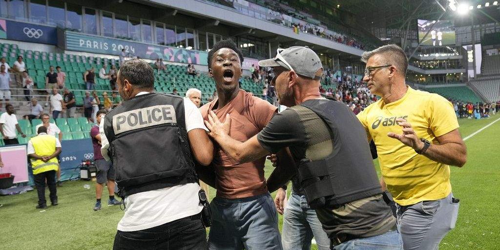 Olympic Football Tournament Marred by Fan's Pitch Invasion Olympic Football Tournament Marred by Fan's Pitch Invasion