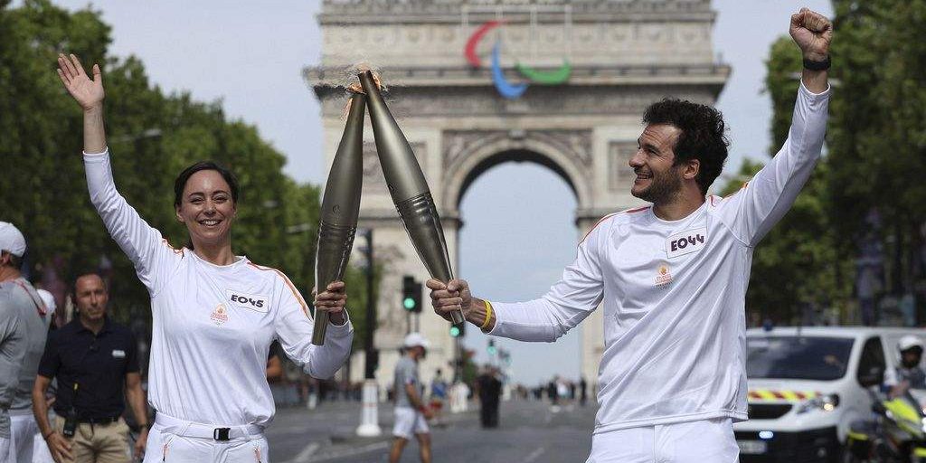 Olympic Torch Arrives in Paris for Bastille Day and Olympic Olympic Torch Arrives in Paris for Bastille Day and Olympic
