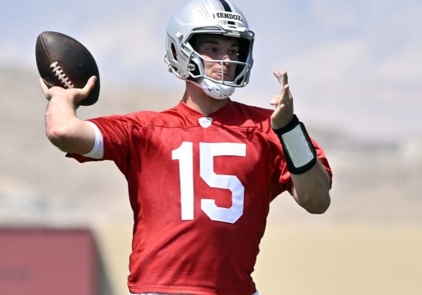 Fernando Mendoza learning to play from under center for the first time in the NFL
