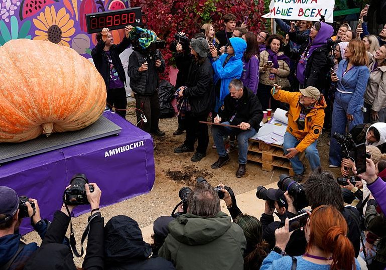 Russian Farmer breaks national record with 969 kilo pumpkin at giant vegetable showdown