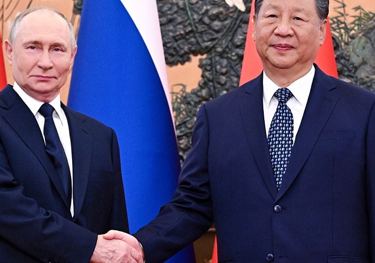 Xi and Putin hold high-stakes talks in Beijing ahead of major military parade