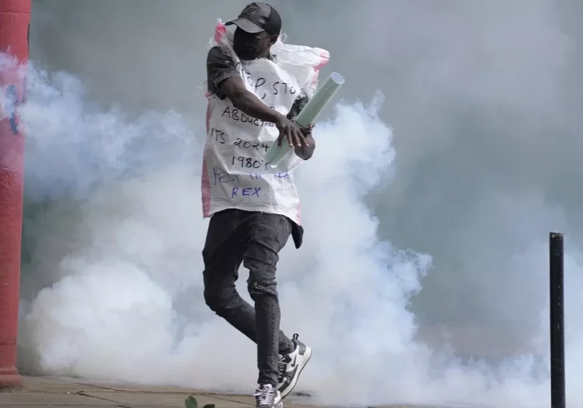 a protester returns back a teargas canister to kenya police in nairobi kenya thursday june 27 2024 a protester returns back a teargas canister to kenya police in nairobi kenya thursday june 27 2024