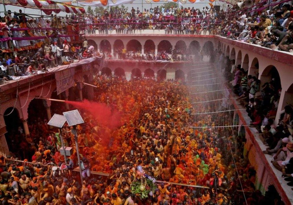 FILE PHOTO: Hindu devotees take part in 'Huranga', at Dauji temple near Mathura