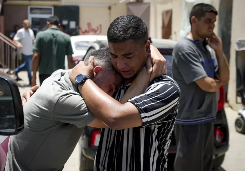 palestinians mourn relatives killed in the israeli bombardment of the gaza strip at a hospital morgue in deir al balah tuesday july 9 2024