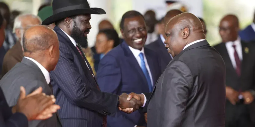 south sudanese president salva kiir mayardit left shakes hands with pagan amum south sudanese president salva kiir mayardit left shakes hands with pagan amum
