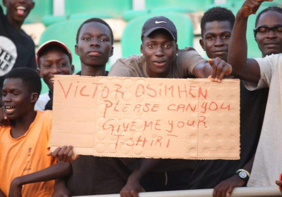 35931 2023 afconq excited guinea bissau fans beg for osimhens jersey