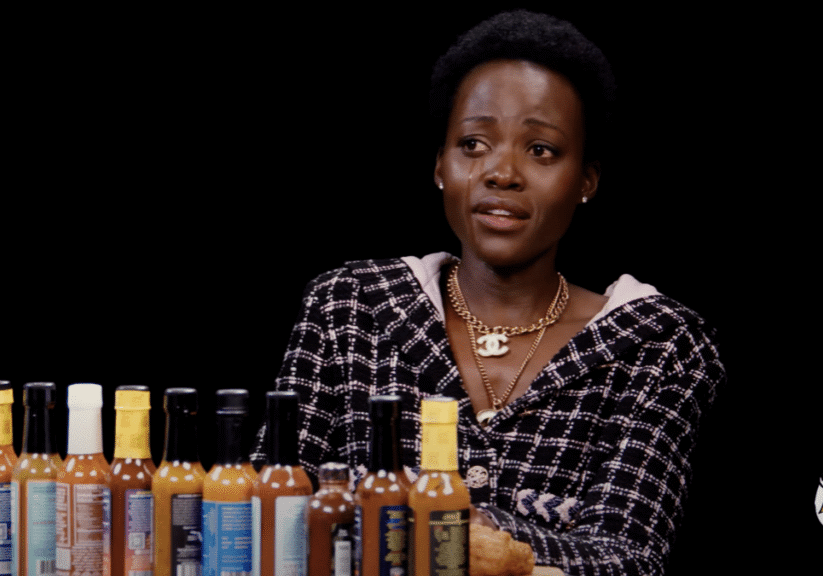Lupita Nyong'o Burns as She Takes on Hot Ones Challenge